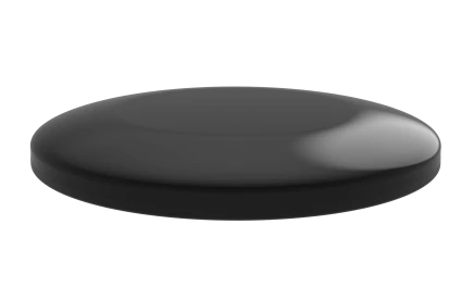 A render of a flat shiny black disk like antenna with a rounded top.