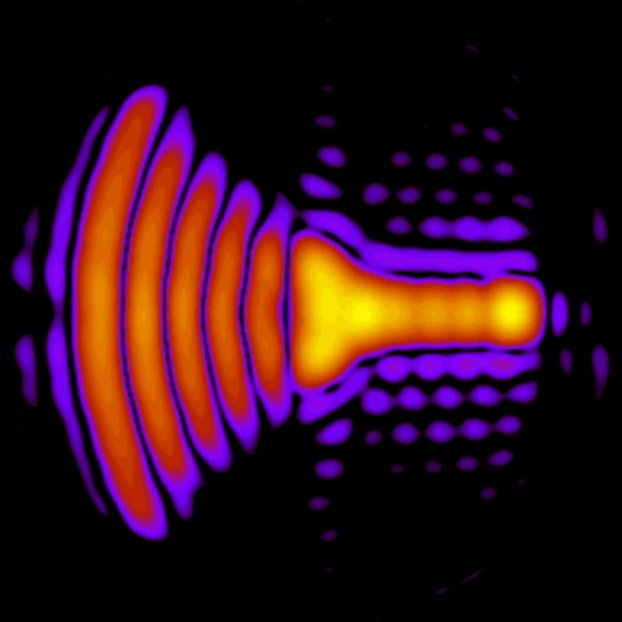 A radiation pattern of a horn with crescent waves coming out of the horn. The background is black.